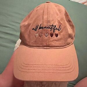 All beautiful hat. Super cute brown with embroidery